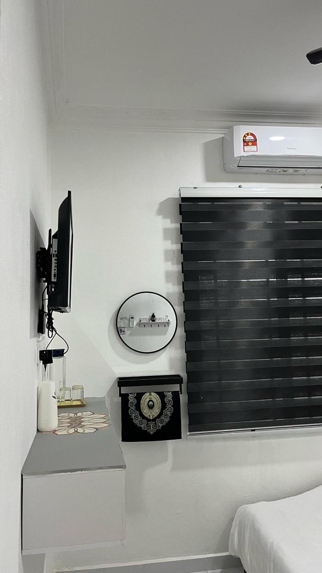 Roomstay By Abe Cottage カンポン・クアラ・ベシュット 部屋 写真