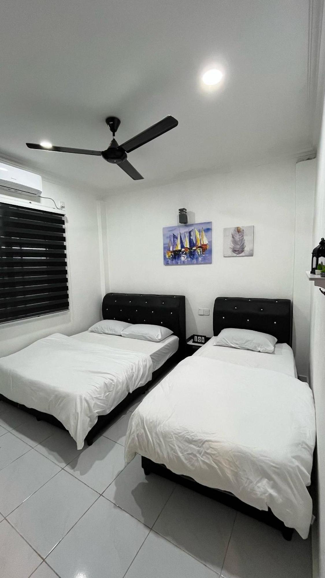 Roomstay By Abe Cottage カンポン・クアラ・ベシュット 部屋 写真