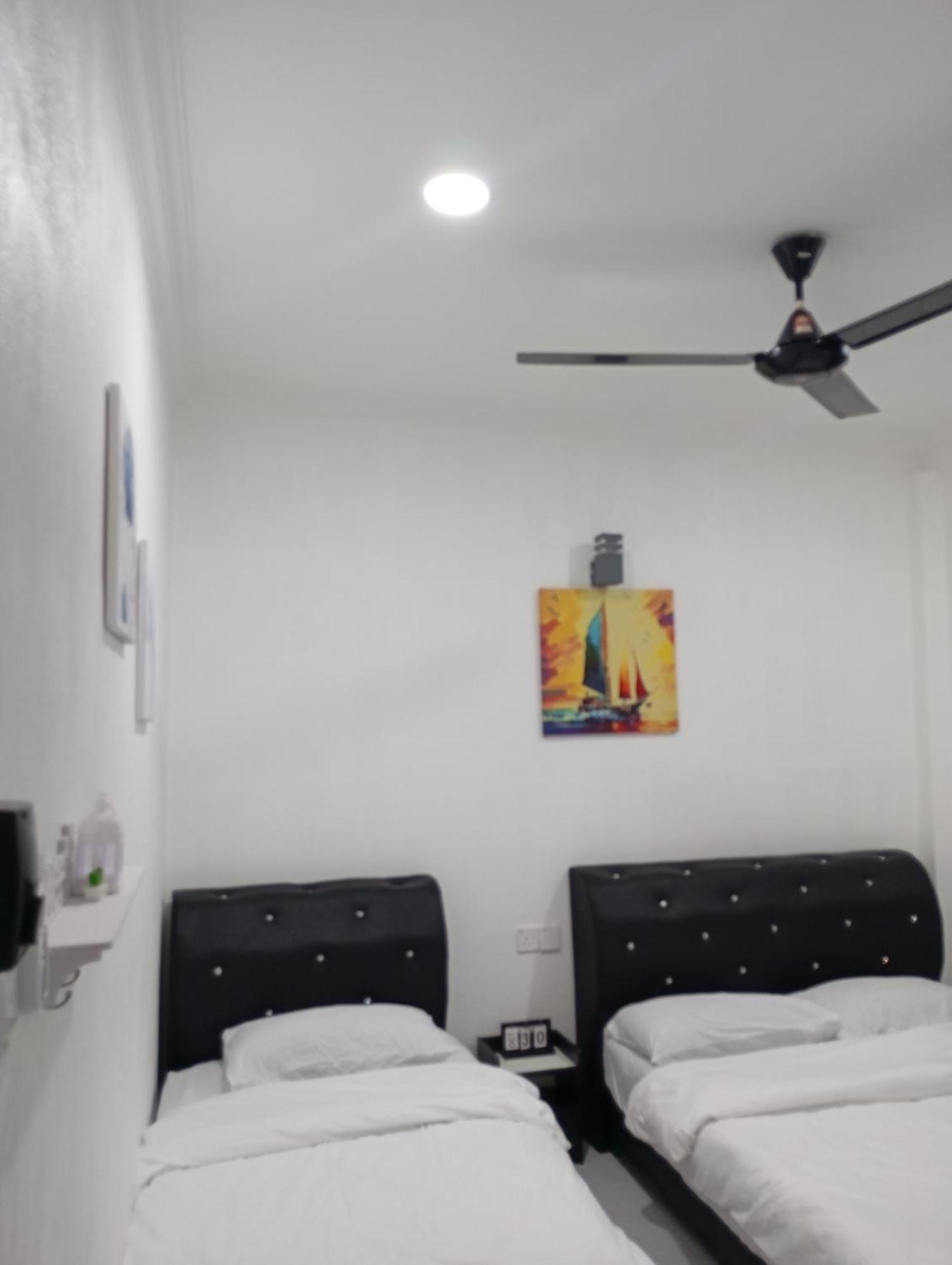 Roomstay By Abe Cottage カンポン・クアラ・ベシュット 部屋 写真